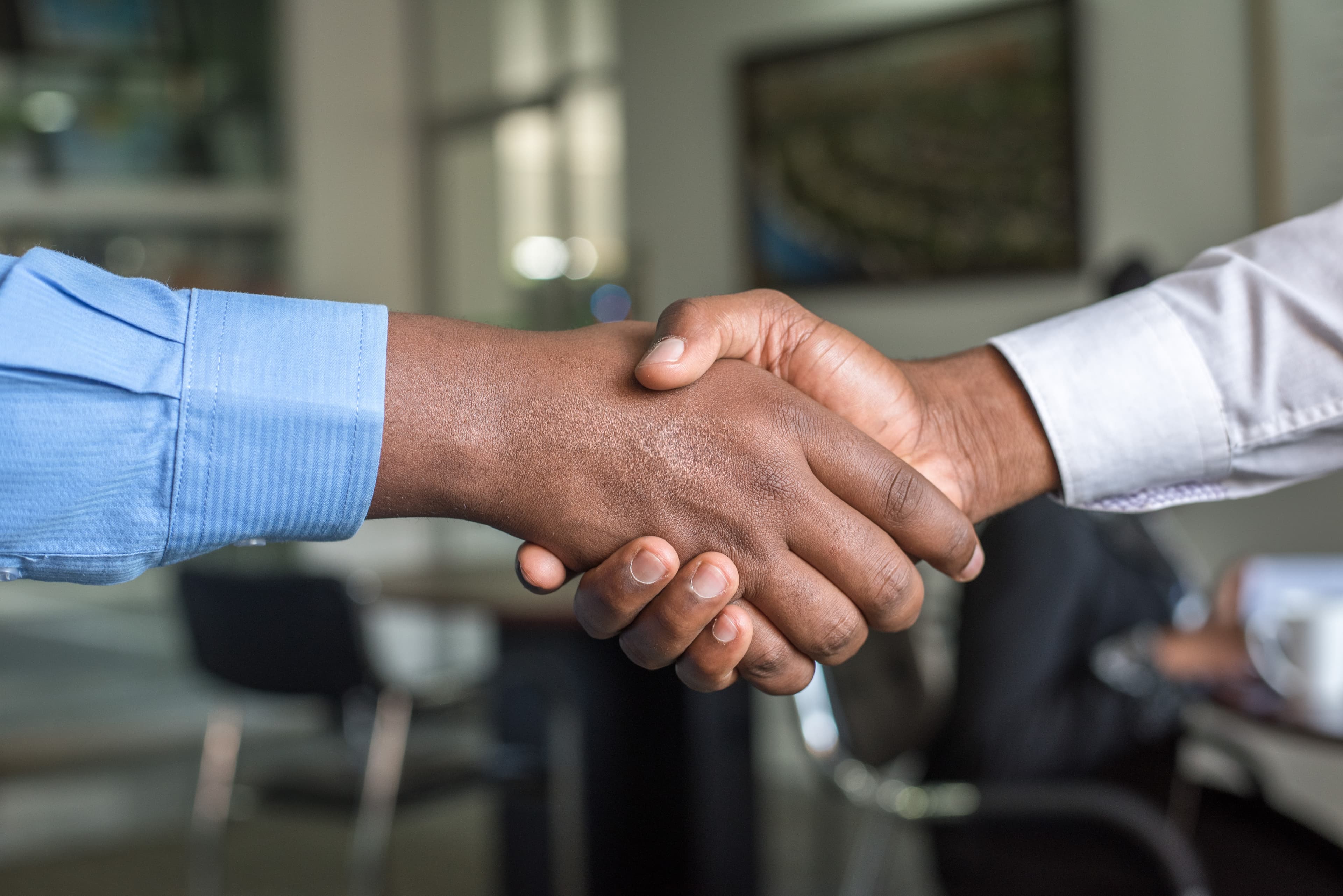 Handshake in a meeting room